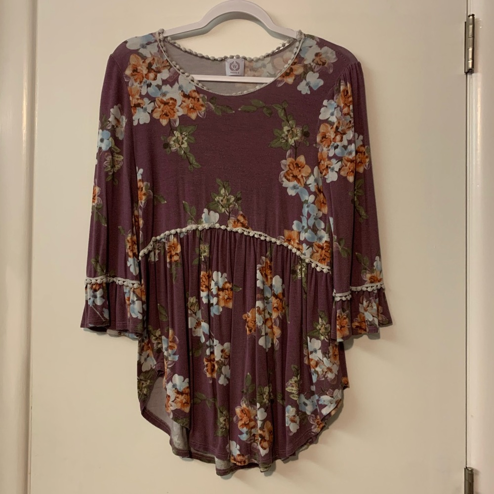 Peplum three quarter floral top